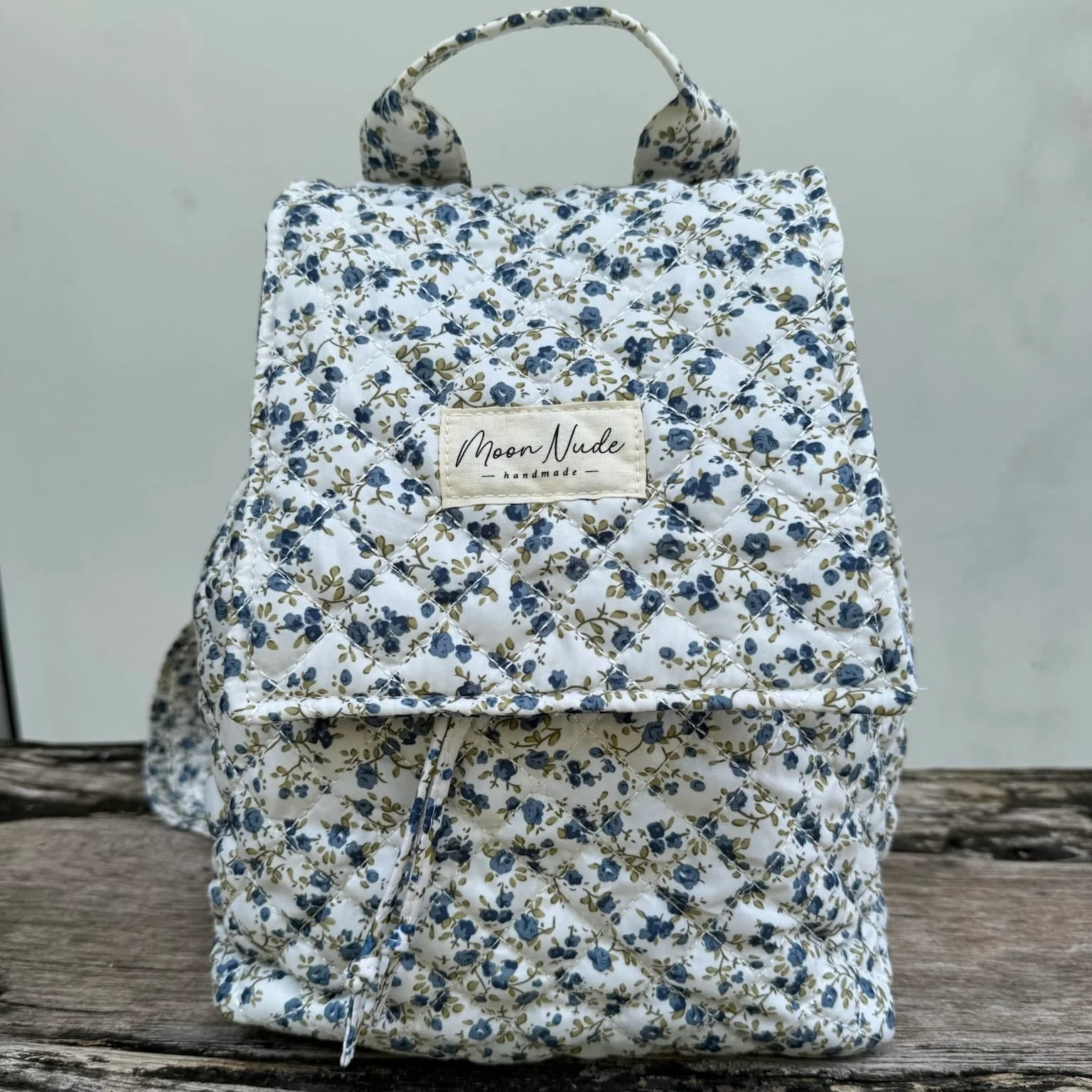 Spring Flap Backpack